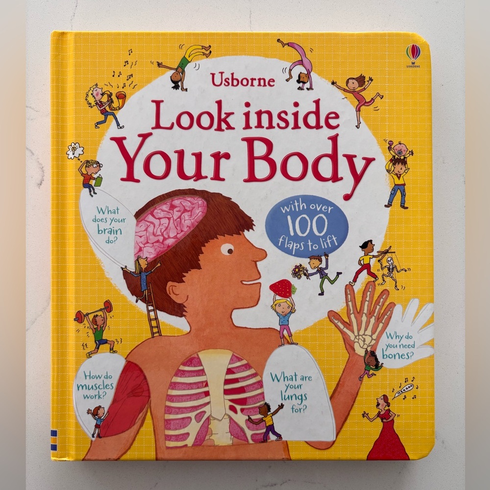 Usborne Look inside your body with over 100 flaps to lift!